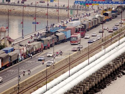 Pipelines in Singapore Thursday August 29, 2002, carry water along the causeway from Malaysia. Singapore receives about 93 inches of rain each year but it isn't enough to meet its needs. It imports half of the 300 million gallons of water it uses every day from Malaysia through this pipeline. Photographer:Munshi Ahmed/Bloomberg News.